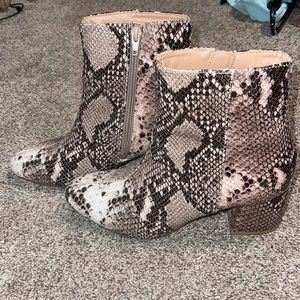 snakeskin booties with a slight heel